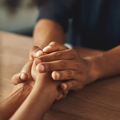 upclose-of-man-holding-womans-hand